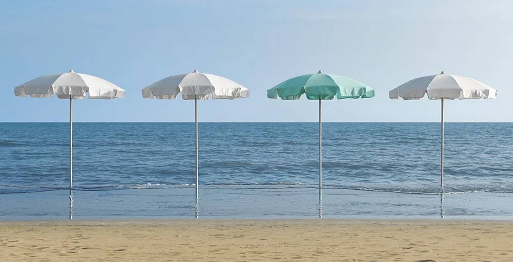 A group of umbrellas on a beach

AI-generated content may be incorrect.